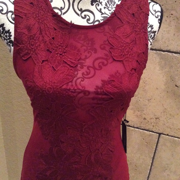 Tops - Sexy 💋Leotard sinful red with a floral stitching.